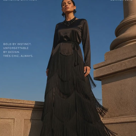 woman in maeisonali black fringe dress